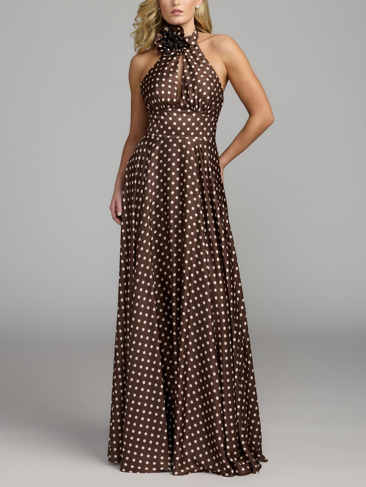 Brown halter-neck maxi dress with polka dots and 3D floral details