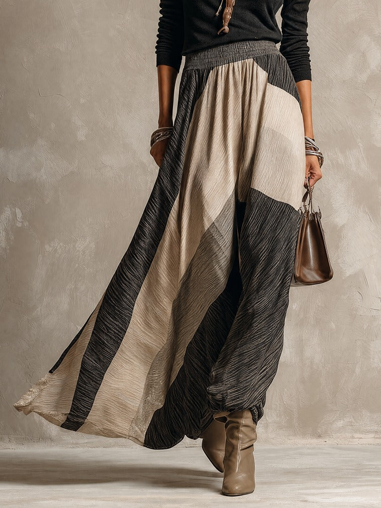 Black top and color-block pleated maxi skirt set
