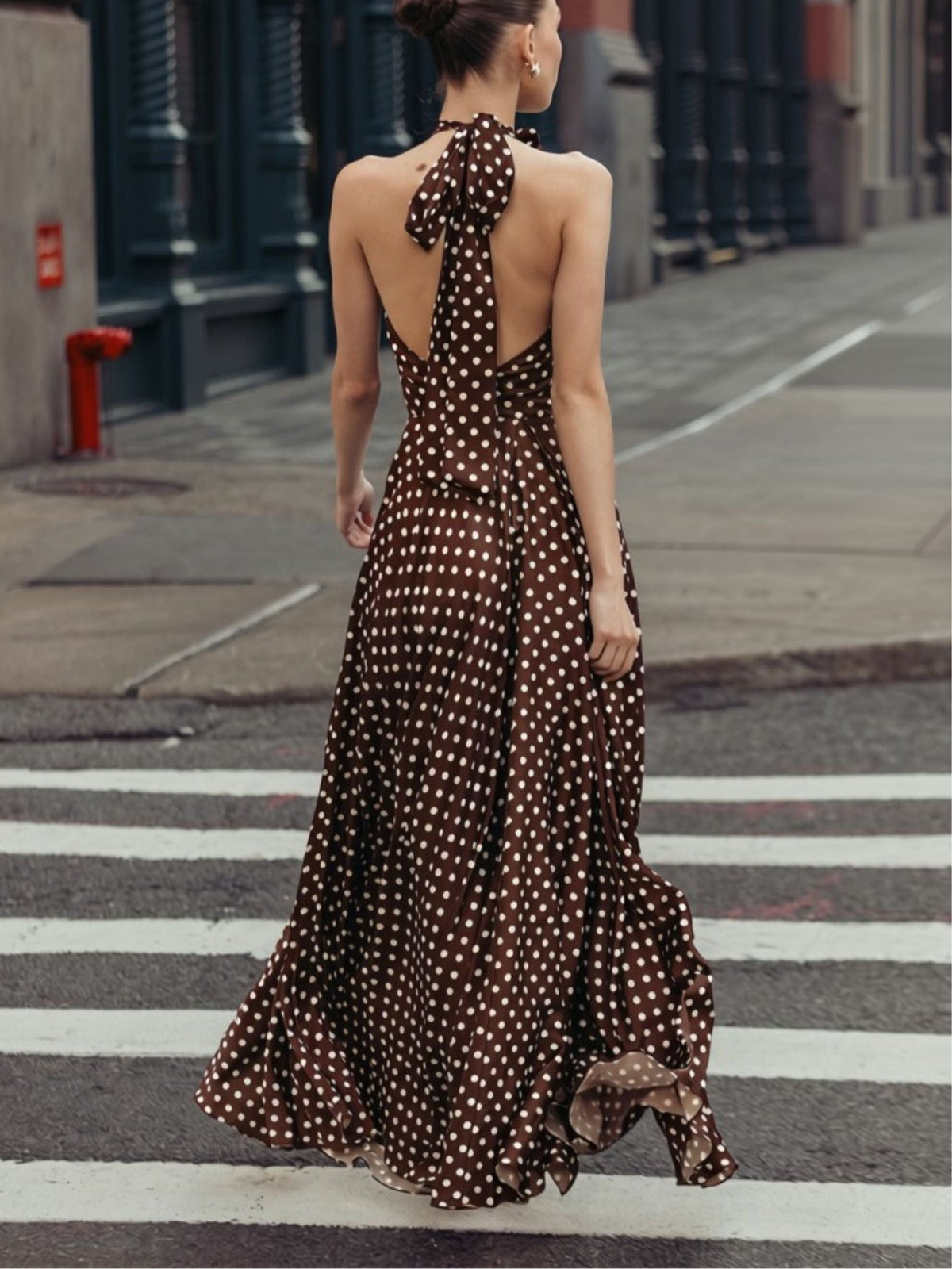 Brown halter-neck maxi dress with polka dots and 3D floral details